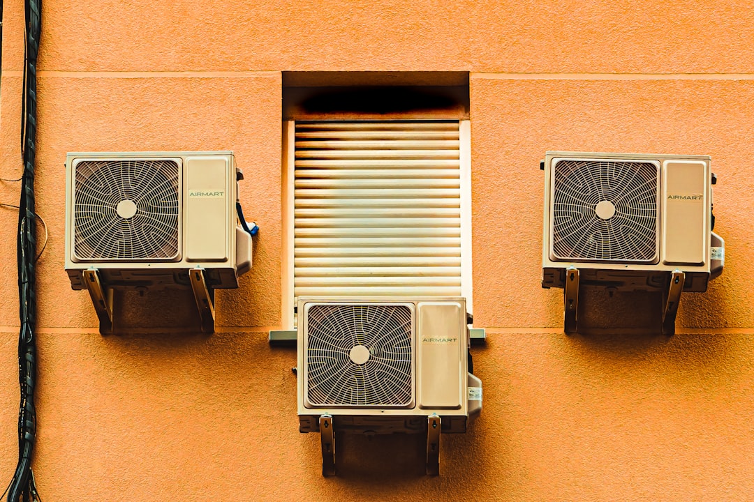 Outdoor HVAC equipment representing heating and air conditioning service businesses. Photo by Jose Antonio Gallego Vázquez on Unsplash.